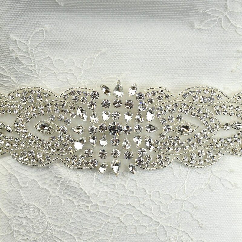 This diamante wide belt is adorned with stunning rhinestone diamantes and beading detail.