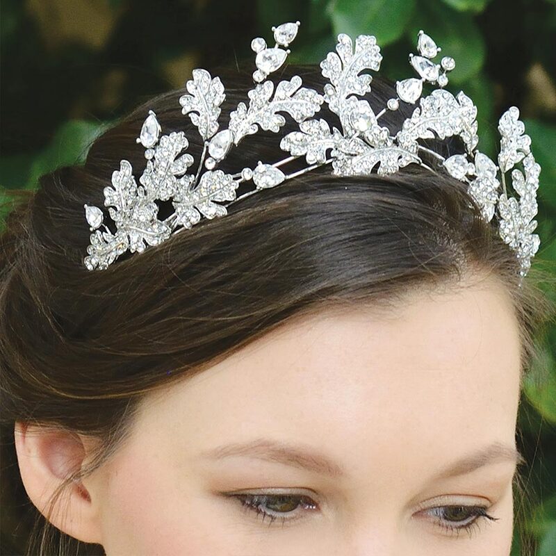 Accented with vintage Oak leaf elements the large cut solitaire and pear shaped stones give this design real depth and an authentic dazzle. This tiara is ideal for brides wanting to make a statement as this has such impressive shine and is so unique with it’s botanical styling.