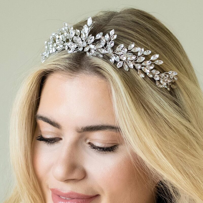 Winterstar is a sparkling and contemporary tiara made with light-catching marquise crystals in a dazzling starburst design. A stunning bridal headpiece for a winter wedding.