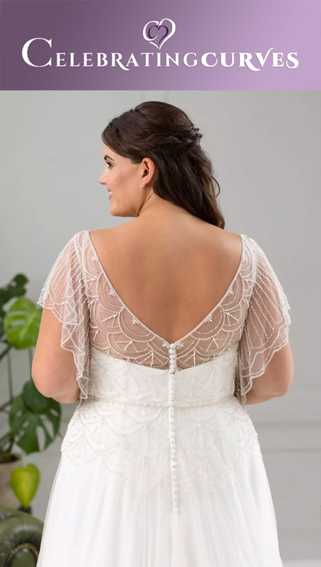 True curves beaded wedding dress with sleeves for plus size bride