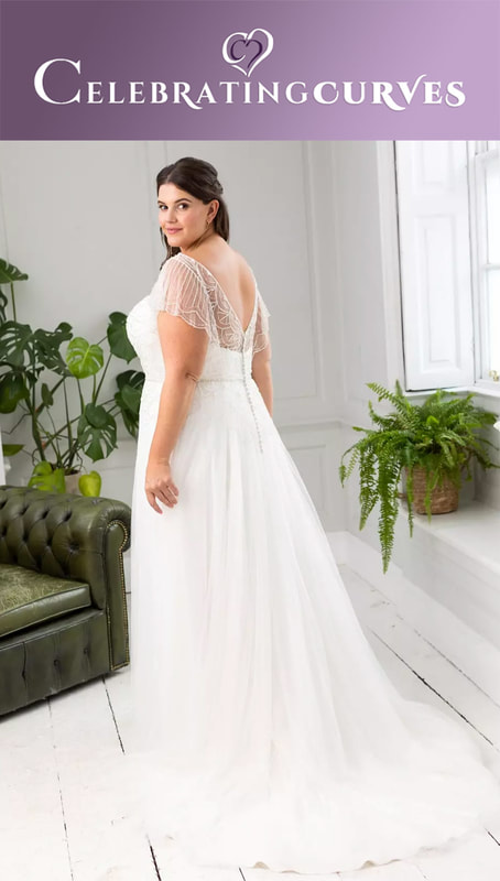 True curves vintage inspired bridal gown with sleeves for plus size bride on wedding day