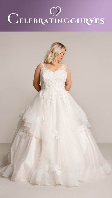 Wedding ball gown with a playful layered skirt for plus size bride